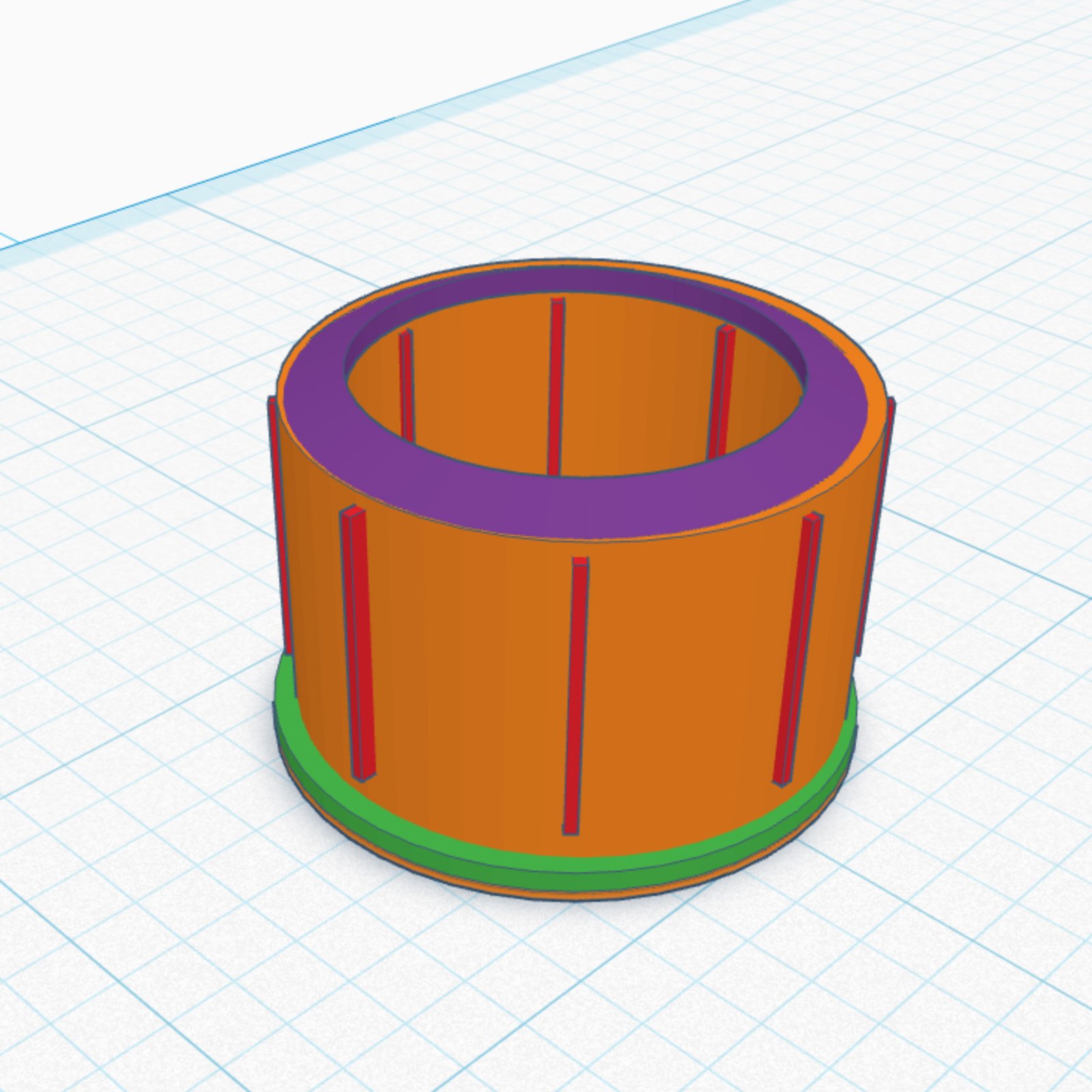 Digital 3D model of a cylindrical bushing with vertical ribs, shown in orange, purple, green, and red parts.